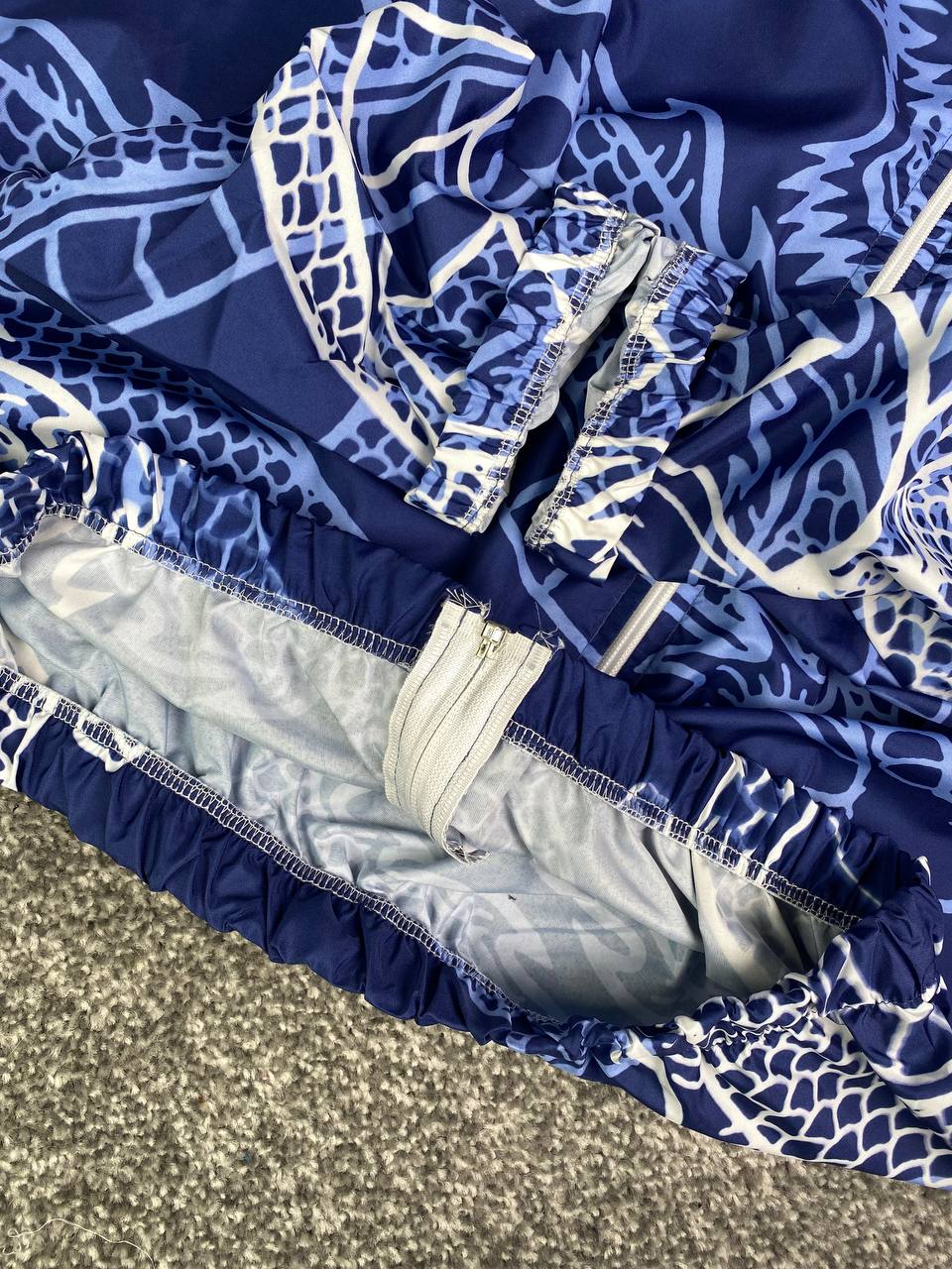 جاكيت ريال مدريد ازرق مطري خفيف