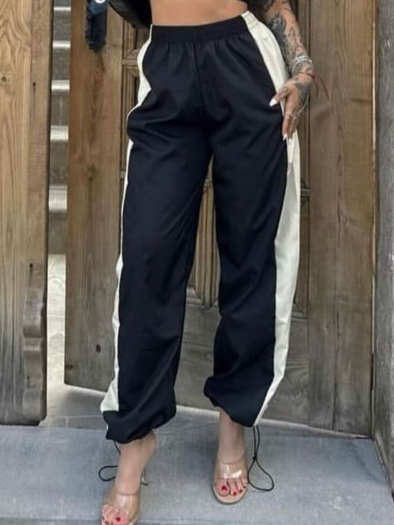 بجامة رياضية اسود , خصر لاستيك,قماش مطري , قالب طبيعي