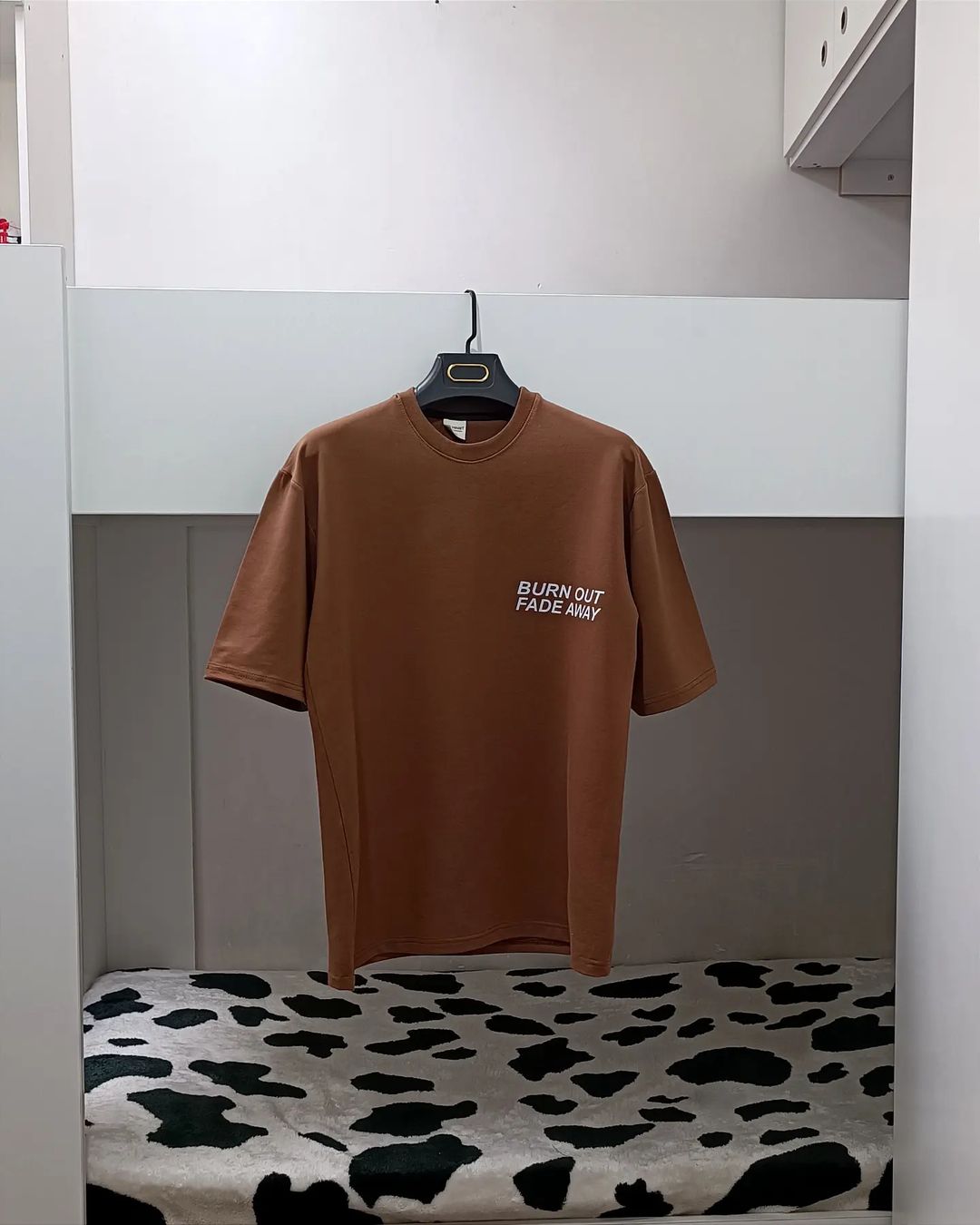 تيشيرت نعود الى الاسود