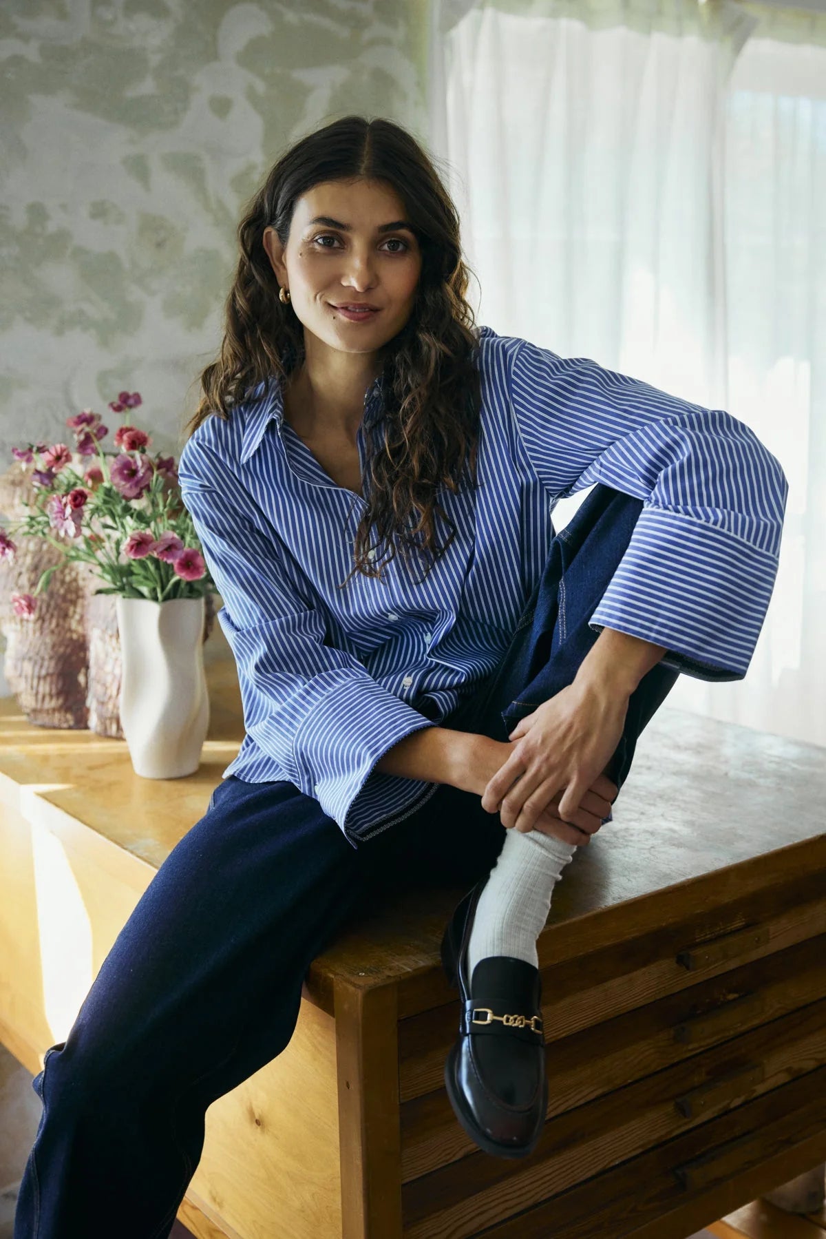 قميص نسائي مخطط ازرق وابيض