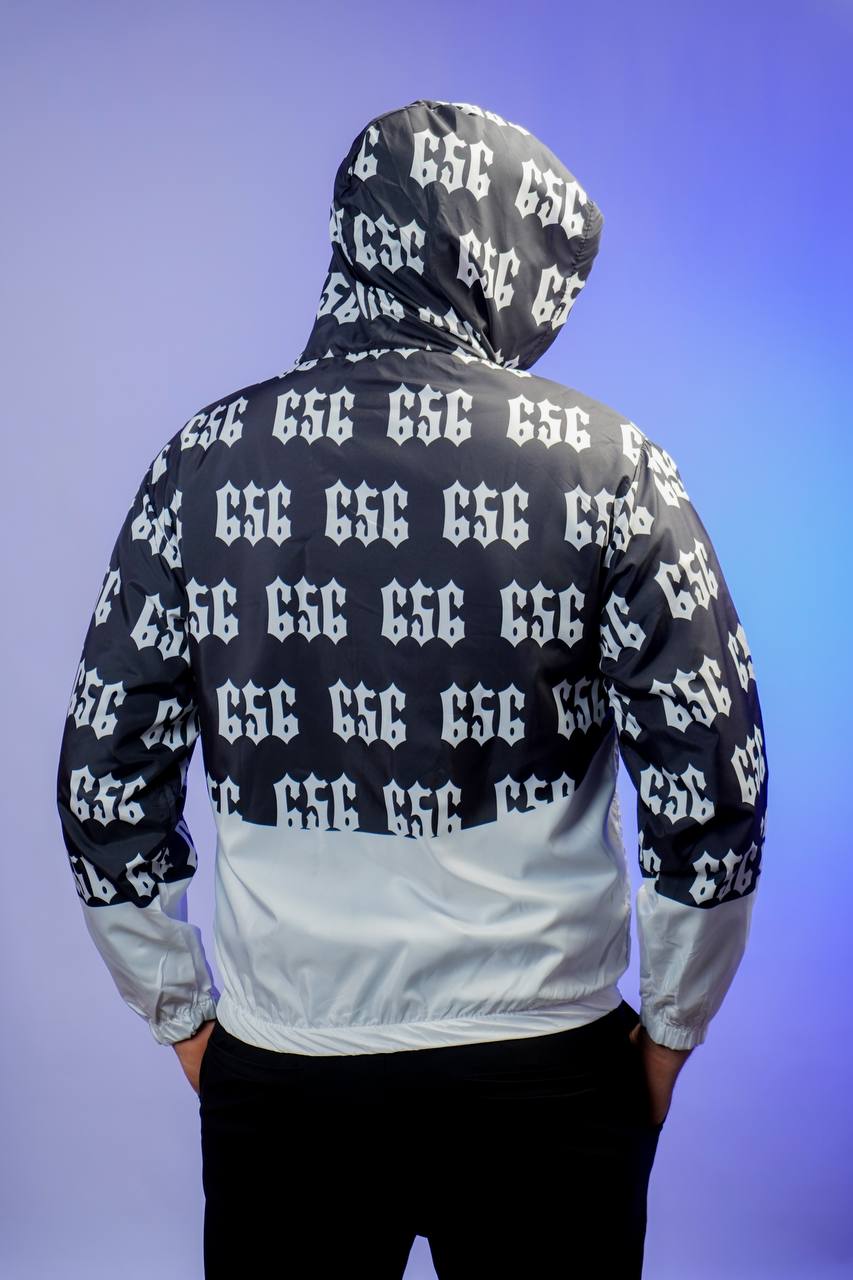 جاكيت 656 اسود وابيض مطري خفيف✅