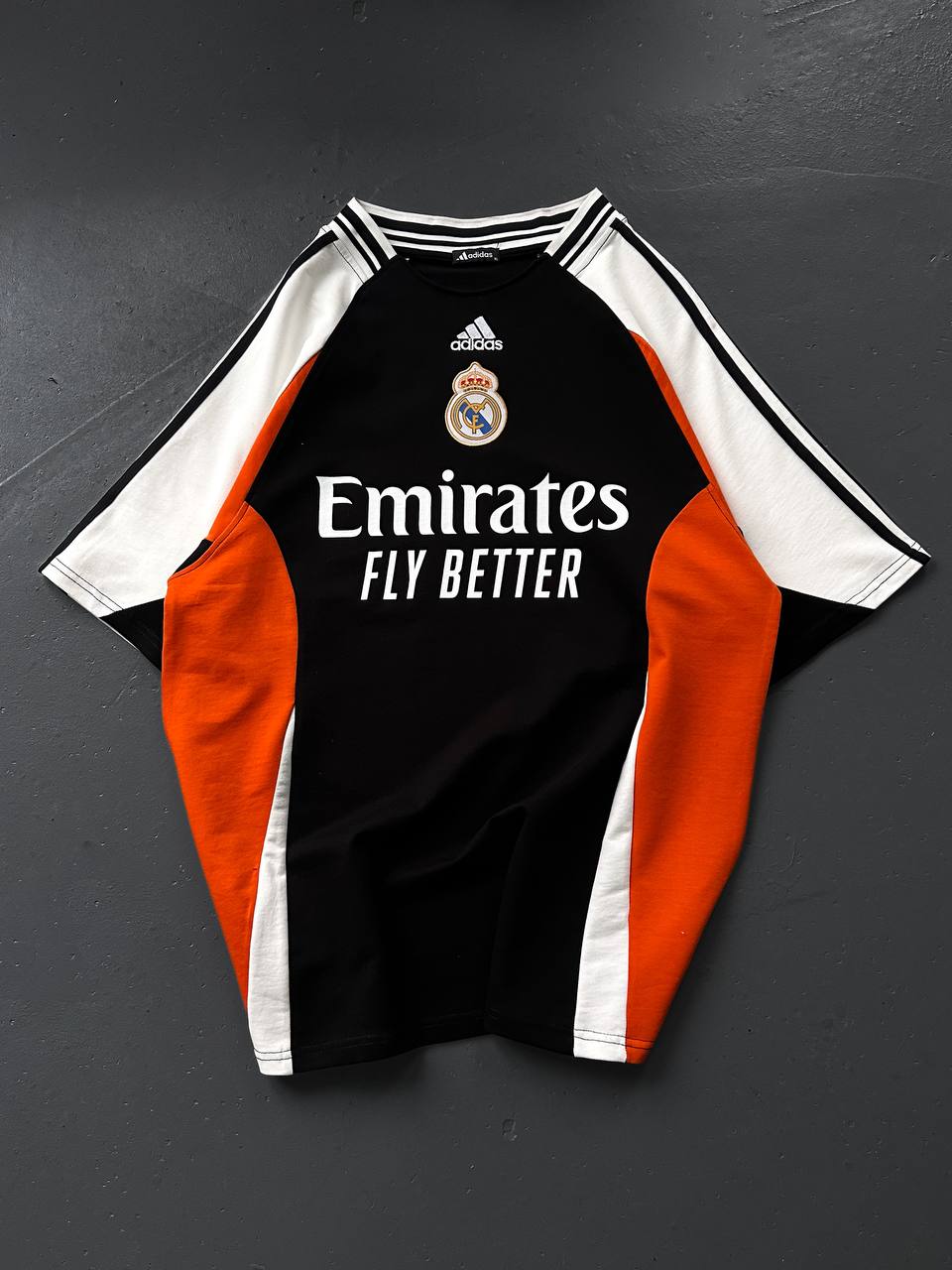 تيشيرت ريال مدريد اديداس اسود وبرتقالي , قالب كبير