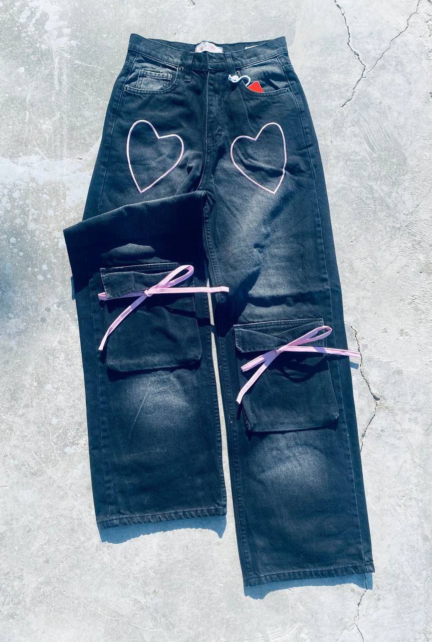 بنطرون جينز نسائي فيونكة جيب من الاسفل فضفاض اسود