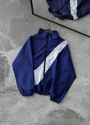 جاكيت نايك ازرق وابيض , مطري خفيف ✅