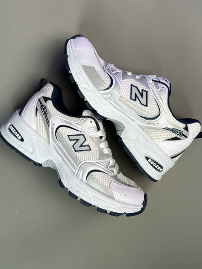 حذاء نيو بلانص رياضي ابيض ونيلي ,قالب طبيعي (القياسات بين 36>44) New Balance 530
