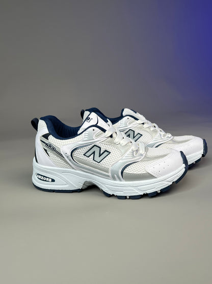حذاء نيو بلانص رياضي ابيض ونيلي ,قالب طبيعي (القياسات بين 36>44) New Balance 530