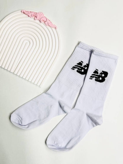 جوارب نيو بلانص ابيض