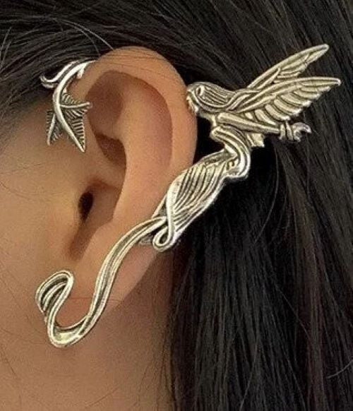 طوق اذن بتصميم فتاة ونجمة